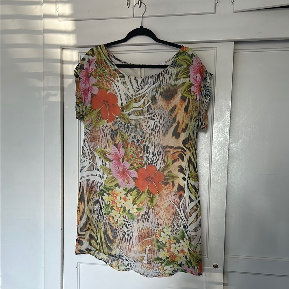 Tropical Floral and Animal Print Mini Dress flows gracefully
